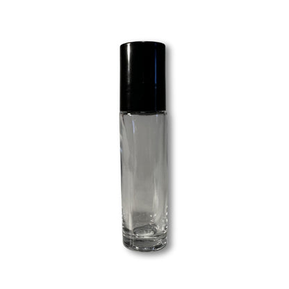 A clear glass bottle with a black cap is shown against a white background.