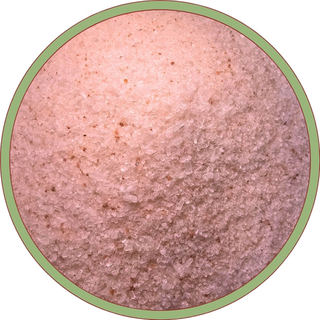 A close-up image of a pile of pink salt, with a green border around it.