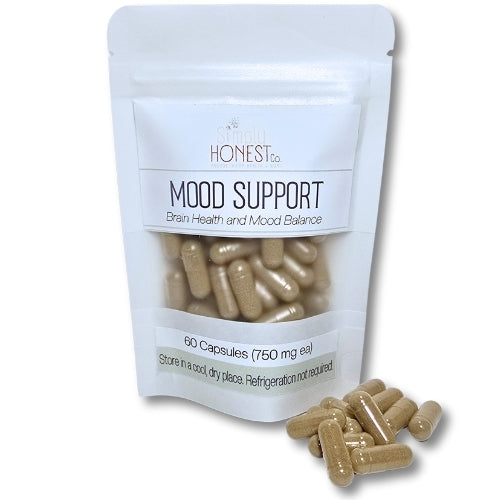 A white package of mood support capsules from the Honest Tea brand, containing 60 capsules with a total weight of 750 mg.