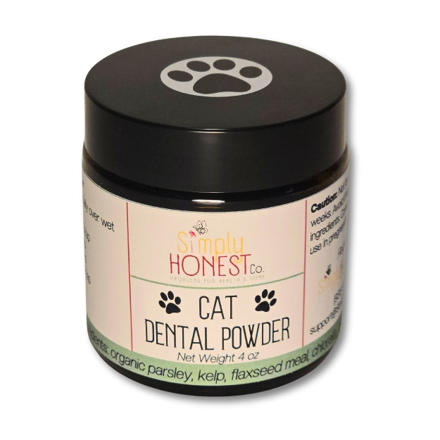 A jar of cat dental powder with a black lid and a paw print logo.