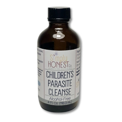 A brown glass bottle with a black cap, containing a liquid that appears to be a children's parasite cleanse.