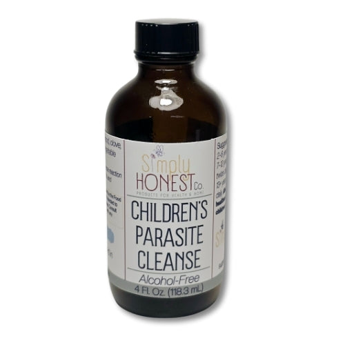 A brown glass bottle with a black cap, containing a liquid that appears to be a children's parasite cleanse.