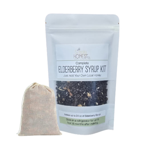 a bag of Elderberry Syrup Kit and a small bag of Elderberry tea bags, both sitting next to each other.