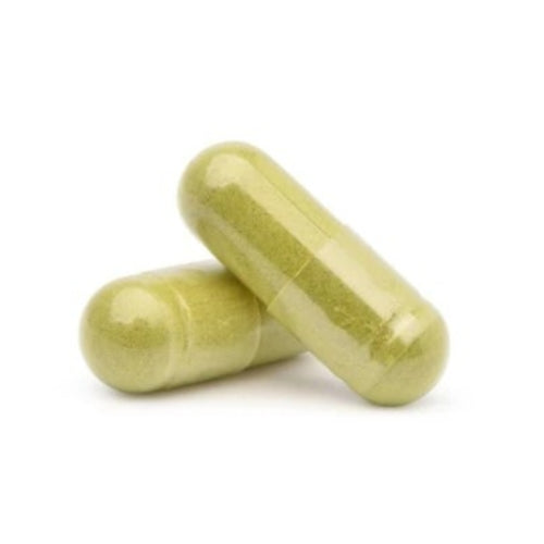 Two green capsules are shown against a white background.