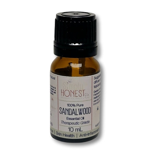 a bottle of sandalwood essential oil