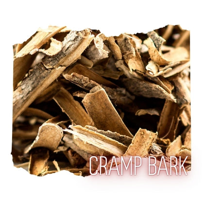 A close-up image of a pile of brown, dried bark pieces.