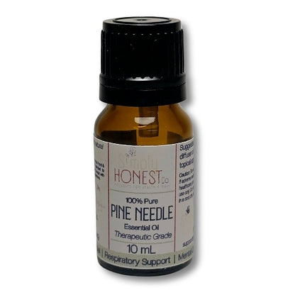 a bottle of pine needle oil on a white background